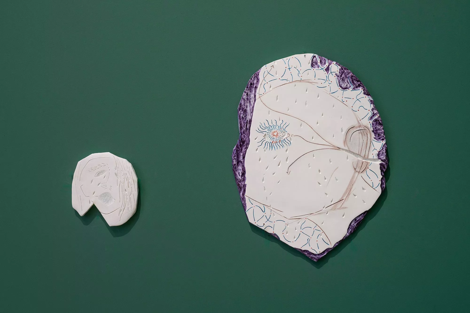 Gaia Fugazza - Gaia Fugazza, Puddle, 2024, porcelain bas-relief in an irregular oval shape.