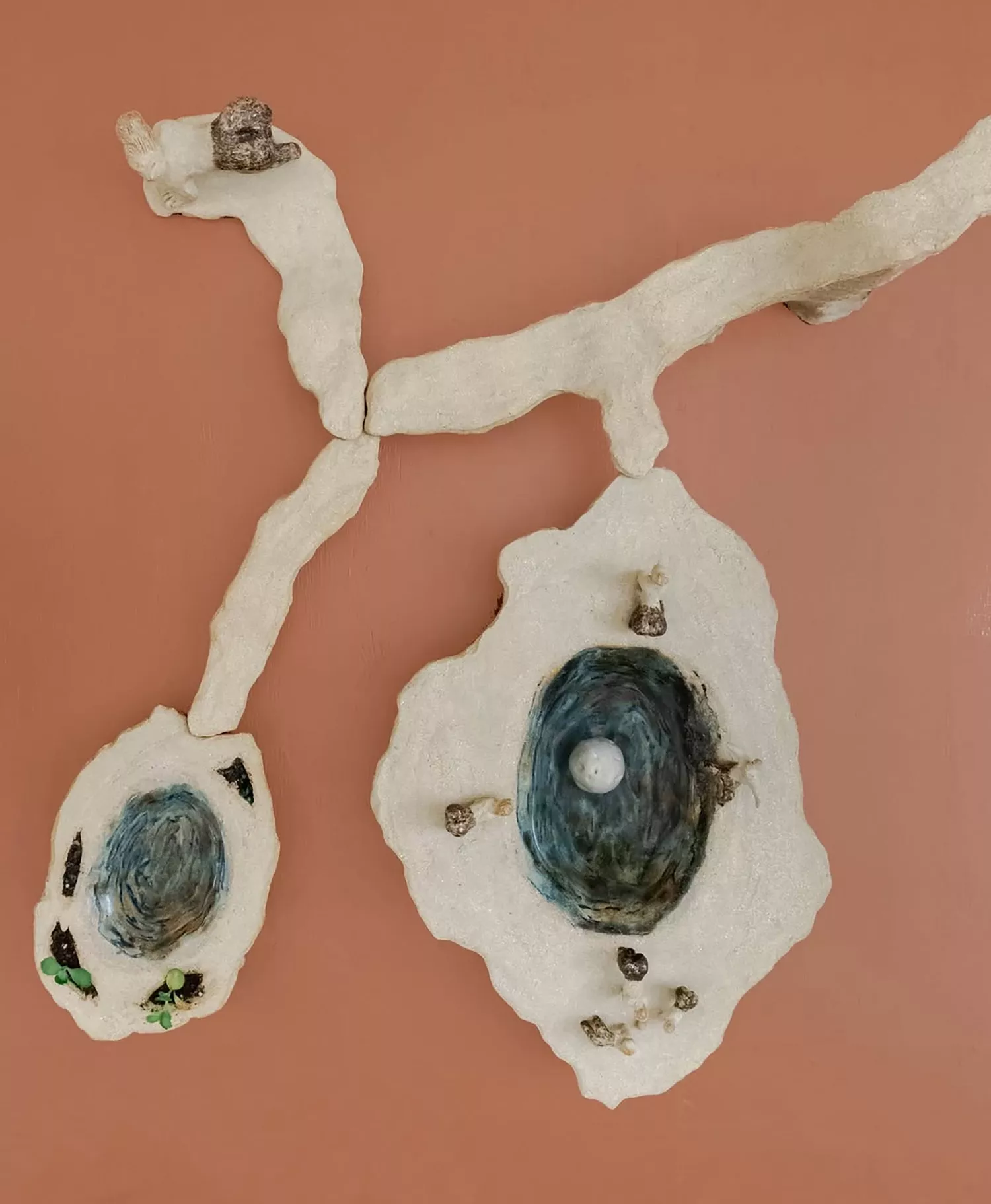 Gaia Fugazza - Gaia Fugazza, Those Who Walk Away, 2023, aerial view of hand-built earthenware ceramic sculpture with therianthropic figures, live plants and water.